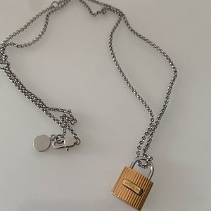 Necklace with dust bag